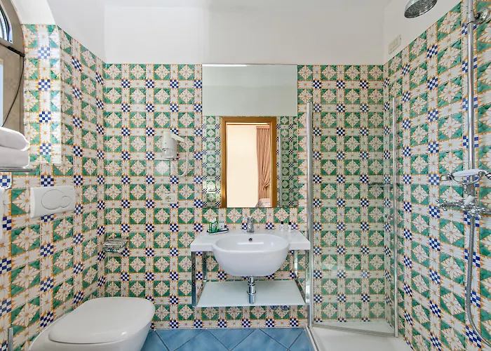 Hotell Grand Due Golfi 4*